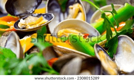 Culinary Symphony: 4K Ultra HD Close-Up of Clam Cooking with Fresh Vibrant Vegetables, a Palate-Pleasing Performance