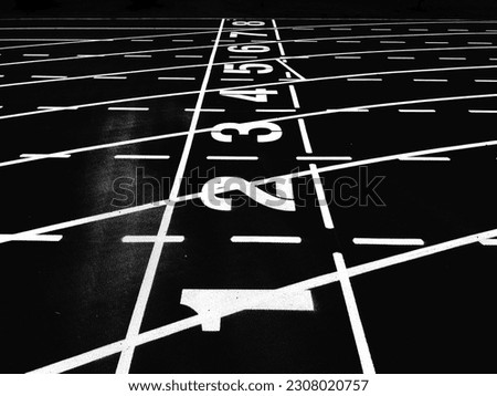 Start and Finish point of a race track in a stadium(Black and white photo)