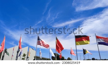 Lembang, bandung Indonesia - Mei 14 2023 : flags line up neatly against the backdrop
blue sky