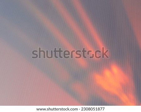 Orange glare on white plastic sheet for abstract minimalist style background.