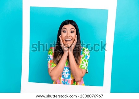 Photo borders memories card event memories young girl hands cheeks black hair wear flowers print t-shirt isolated on blue color background