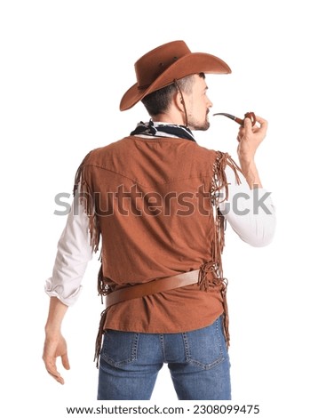 Handsome cowboy with smoking pipe on white background, back view Royalty-Free Stock Photo #2308099475