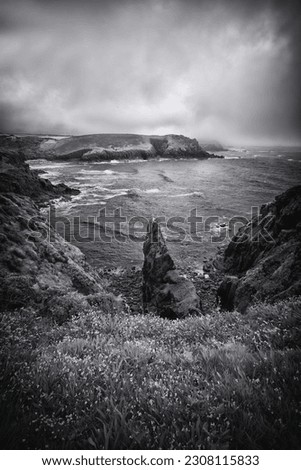 Looking towards nanjizal in infrared light black and white Cornwall UK 