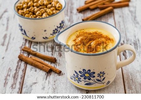 Boza or Bosa, traditional Turkish dessert made of millet or corn flour Royalty-Free Stock Photo #230811700