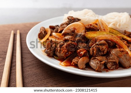 Whelk with somen with spicy sauce and vegetables Royalty-Free Stock Photo #2308121415