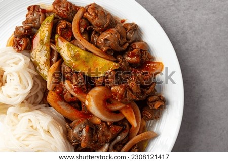 Whelk with somen with spicy sauce and vegetables Royalty-Free Stock Photo #2308121417