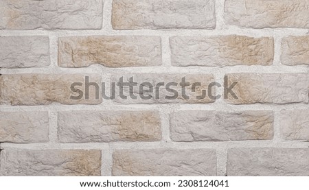 Abstract weathered texture stained old stucco light gray and aged paint white brick wall background in rural room, grungy rusty blocks of stonework technology color horizontal architecture wallpaper