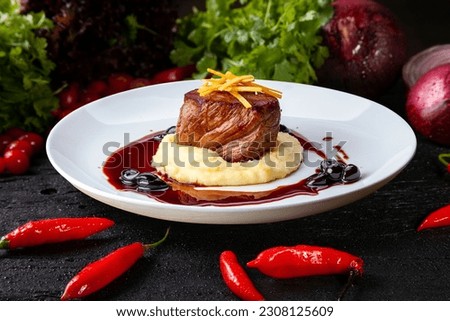 roasted and grilled steak with mashed potatoes, filet mignon Royalty-Free Stock Photo #2308125609