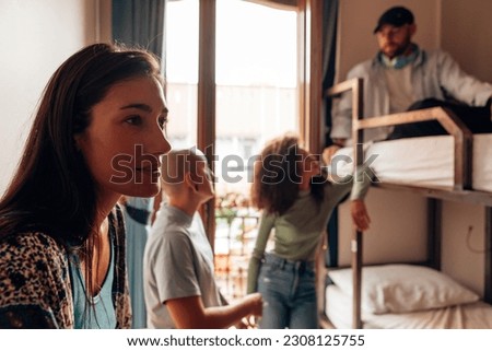 Young collegians talk and interact in the university dormitory Royalty-Free Stock Photo #2308125755