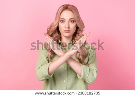 Portrait of serious focused girl crossed arms demonstrate stop enough symbol isolated on pink color background