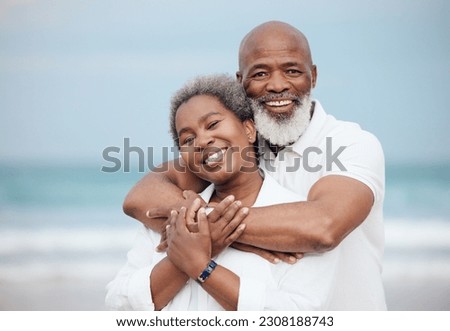 Hug, portrait and a senior couple at the beach for a vacation, retirement travel and walking. Smile, love and an elderly man and woman hugging with affection on a date by the ocean in Portugal