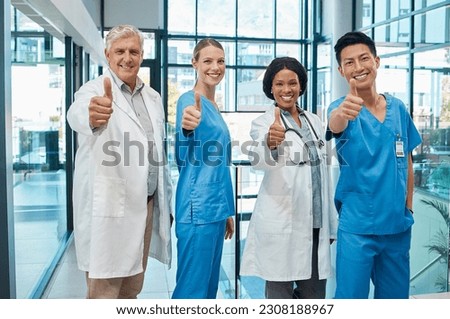 Thumbs up, doctors and healthcare group in a hospital for support, teamwork and trust. Portrait of diversity men and women medical team hands for collaboration, professional care and health insurance