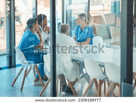 Doctors, healthcare team and meeting for a discussion, planning or training at table. Diversity men and women medical group talking about communication strategy, virus or surgery in a hospital Royalty-Free Stock Photo #2308188977
