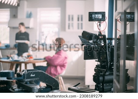 Film set and technology of modern shooting. Film crew, lighting devices, monitors, playbacks - filming equipment and a team of specialists in filming movies, advertising and TV series