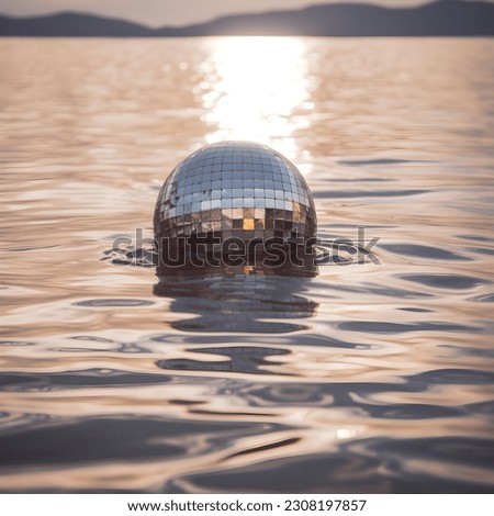 Disco ball floating in the sea. Rave Party  Royalty-Free Stock Photo #2308197857