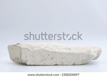 White stone on white background, podium for product Royalty-Free Stock Photo #2308200097