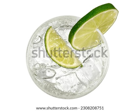 Gin tonic cocktail with lime slices, top view on white background Royalty-Free Stock Photo #2308208751