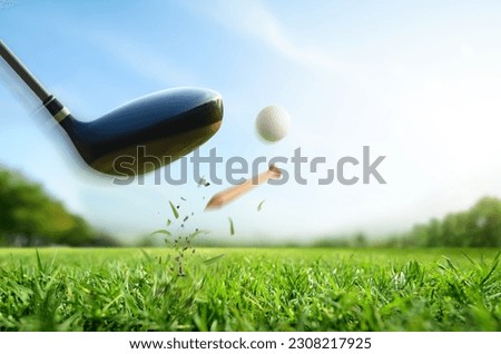 Motion action of teeing off golf ball with drivers. Royalty-Free Stock Photo #2308217925