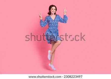 Full length photo of adorable positive lady wear comfort blue trendy clothes have fun v-sign good mood isolated on pink color background Royalty-Free Stock Photo #2308223497