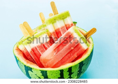 Summer thirst quenching gourmet watermelon popsicles Royalty-Free Stock Photo #2308228485