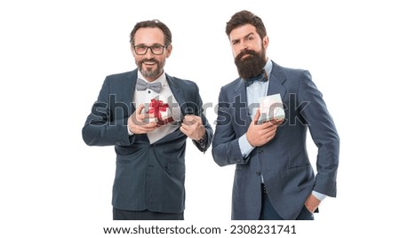 success and reward. esthete. business partners on meeting isolated on white. businessmen in formal suit on party. bearded men hold valentines present. happy birthday shopping. formal men with beard