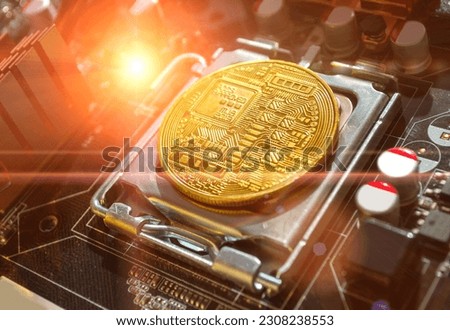 Bitcoin composition. Golden bitcoin among the electronic computer components, business concept of bitcoin digital cryptocurrency. Blockchain technology composition, bitcoin mining concept