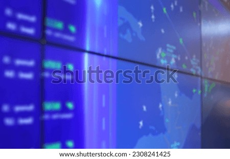 Blurred background of radar air traffic control screen.
