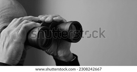 looking through binoculars look ahead for the future with people stock photo Royalty-Free Stock Photo #2308242667