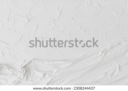 White modern art painting. Abstract painting. Gypsum texture. White plaster on canvas. Beautiful modern white background. Plaster art.