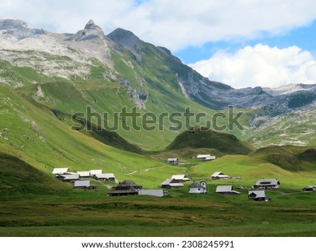 Traditional alpine livestock settlement Tannalp next to Lake Tannensee and in the Uri Alps massif, Melchtal - Canton of Obwald, Switzerland (Kanton Obwalden, Schweiz)
