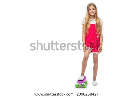 teen girl with skateboard on background, advertisement. photo of teen girl with skateboard.