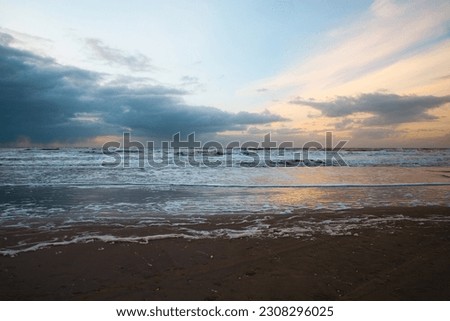 Wadden sea at low tide, North sea beach landscape, coast on Romo island in Denmark at sunset, vacation und lifestyle  Royalty-Free Stock Photo #2308296025