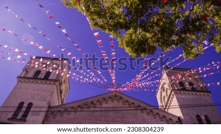 Junina party banners in front of a Brazilian church.