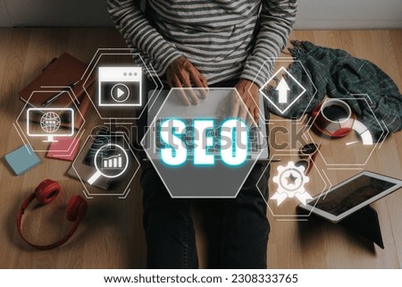 SEO Concept, Search Engine Optimization, Man using laptop computer with VR screen seo icon, concept for promoting ranking traffic on website, optimizing your website to rank in search engines.