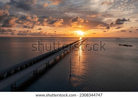 Aerial panoramic view of sunrise in the Florida Keys along the Overseas Highway 1 Seven Mile Bridge Royalty-Free Stock Photo #2308344747