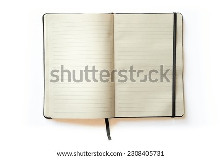 Open notebook isolated on a white background. Notebook with slightly dated stylish lined pages. Royalty-Free Stock Photo #2308405731
