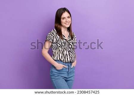 Photo of young candid pretty woman wear vintage zebra print shirt hand pockets jeans office manager isolated on violet color background