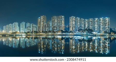 Night scenery of high rise residential building in Hong Kong city