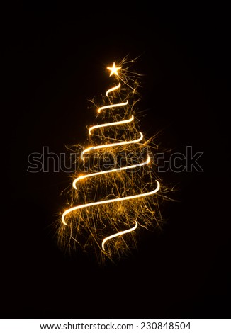 Symbolic Christmas tree created using sparklers.