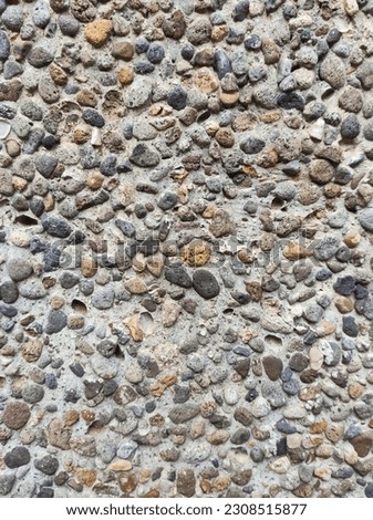 Wall background with colorful small stones