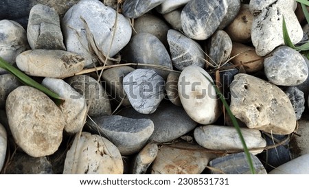 Abstract background pebbles gray white