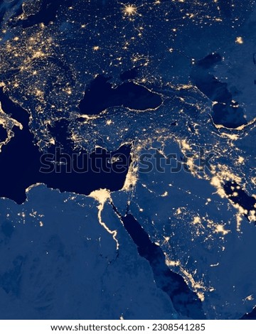 Earth photo at night, City Lights of Europe, Middle East, Turkey, Italy, Black Sea, Mediterrenian Sea from space, World map on dark globe on satellite photo. Elements of this image furnished by NASA.