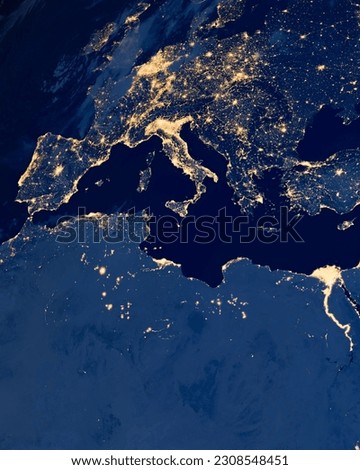 Earth photo at night, City Lights of Europe, Italy, Black Sea, Mediterrenian Sea from space, World map on dark globe on satellite photo. Elements of this image furnished by NASA.