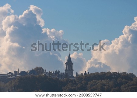 Topkapi Palace with amazing clouds on the background. Travel to Istanbul background photo. Noise included.