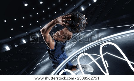 Dynamic image of young man, basketball player in motion, throwing ball into basket in jump at 3D basketball court. Winning goal. Concept of professional sport, competition, action, competition, game