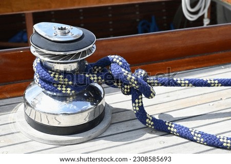 Winch and rope of a sailboat close-up