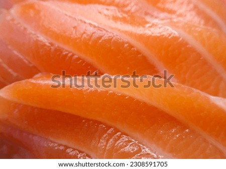 close up raw salmon fillet slices texture, juicy of salmon fish