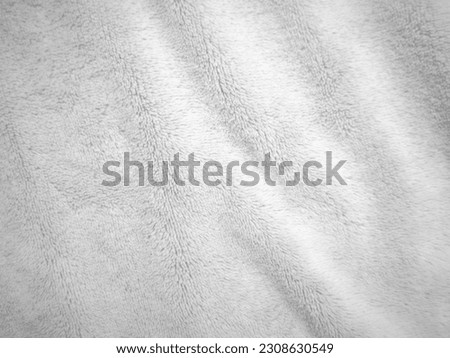 White clean wool texture background. light natural sheep wool. white seamless cotton. texture of fluffy fur for designers. close-up fragment white wool carpet.	