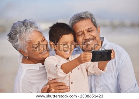 Selfie, smile and grandparents with child at beach for vacation, bonding and generations. Picture, happy and young boy with senior man and woman in nature for travel, happiness and technology