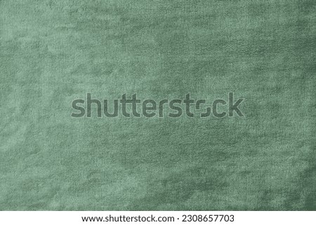 Sage green velvet uneven fabric blank background perfect for photography or banner design with empty space for text or logo. Grungy style Royalty-Free Stock Photo #2308657703